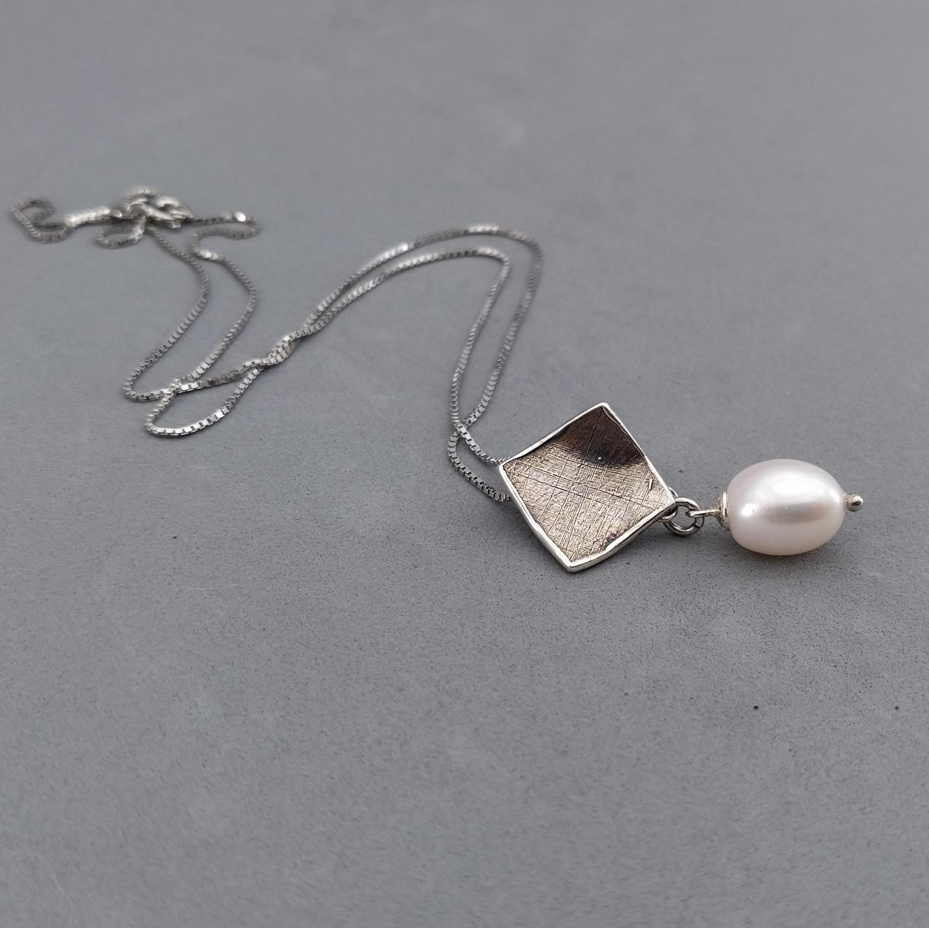 silver and pearl pendant