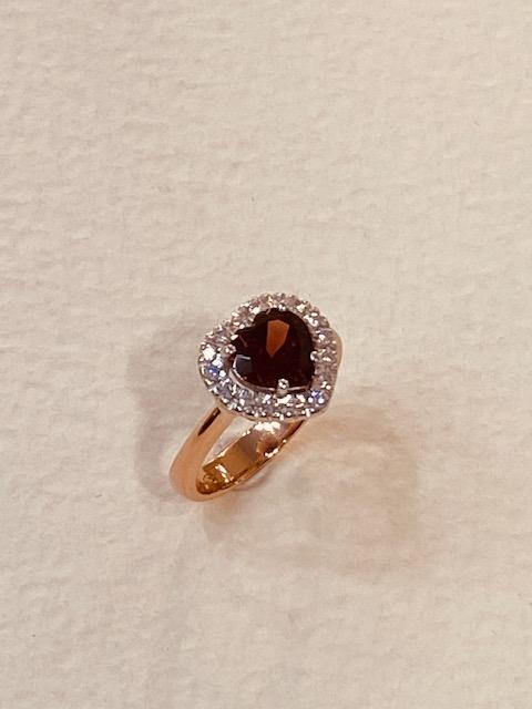 Collezione "Cuori" anello in oro con granato e diamanti naturali