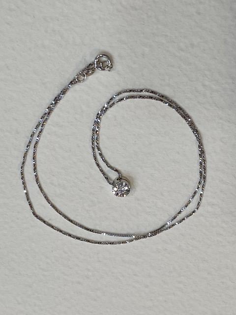 Collezione "Diamanti naturali" Punto luce in oro bianco e diamante naturale