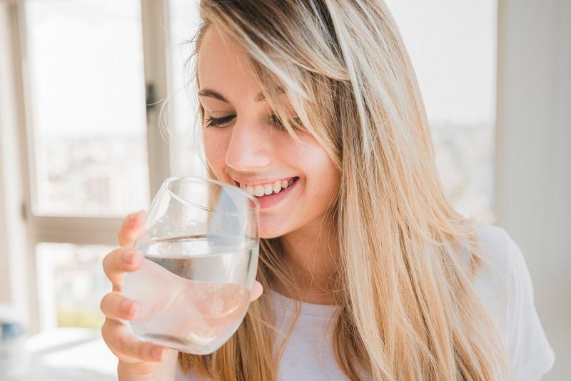 healthy-girl-drinking-glass-of-waterjpg