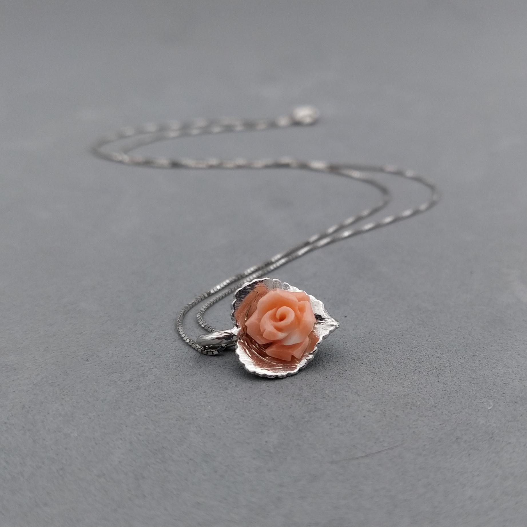 coral and rhodium plated silver pendant