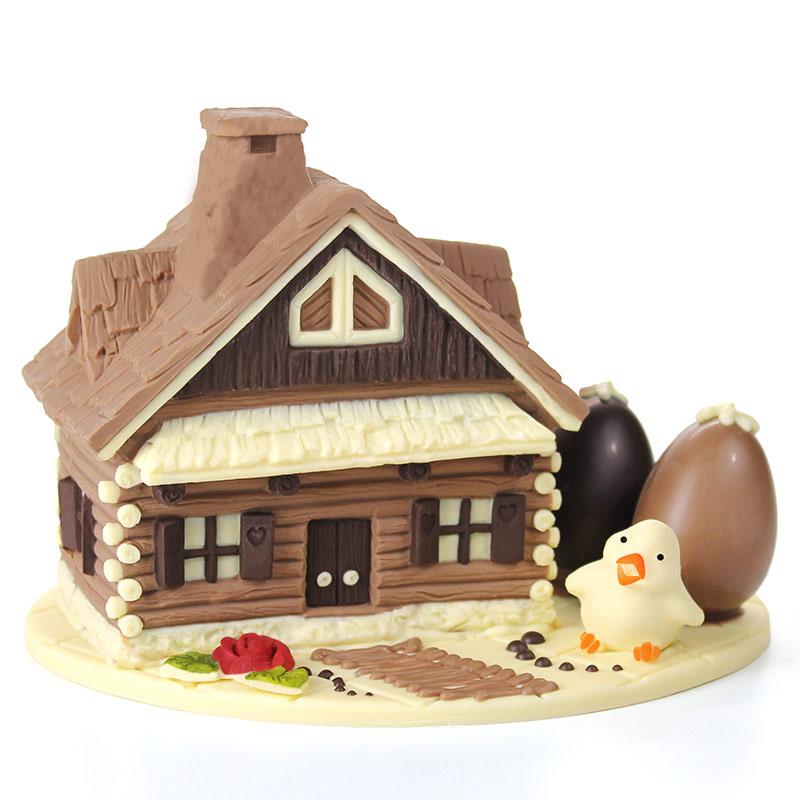 Composizione pasquale di cioccolato “Baita con pulcini e ovetti di Pasqua” 23