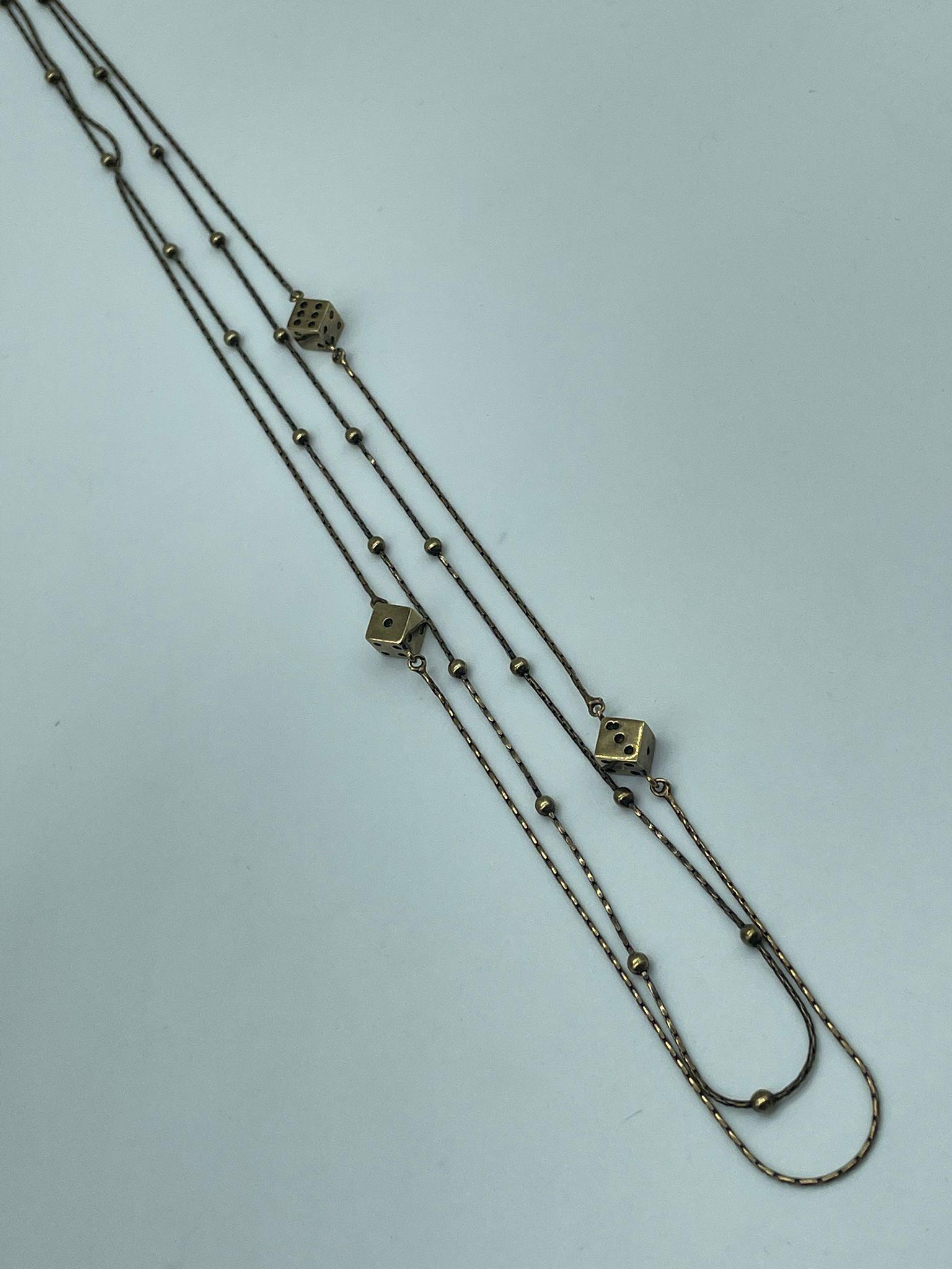 COLLANA A DUE FILI E TRE DADI