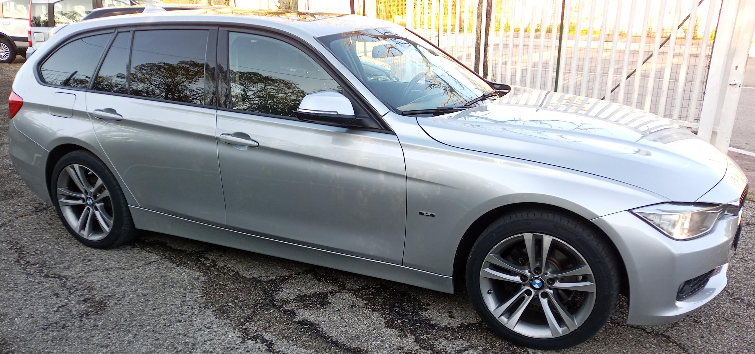 2014 BMW 318d touring sport 12.500 €