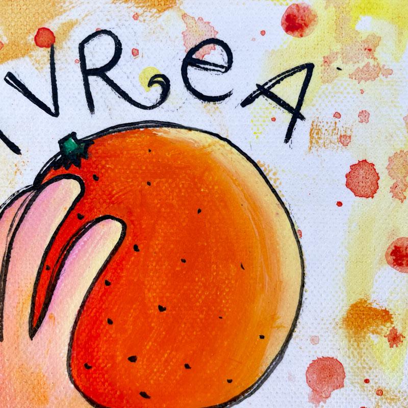 Ivrea - Mano con arancia