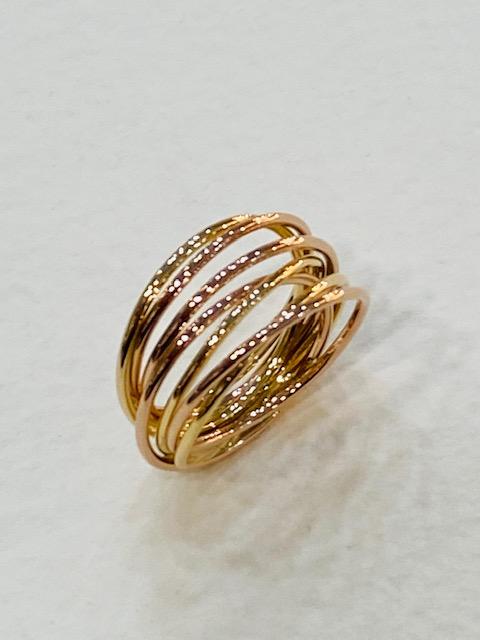 Collezione "Filo di Luce" anello in oro giallo e oro rosa