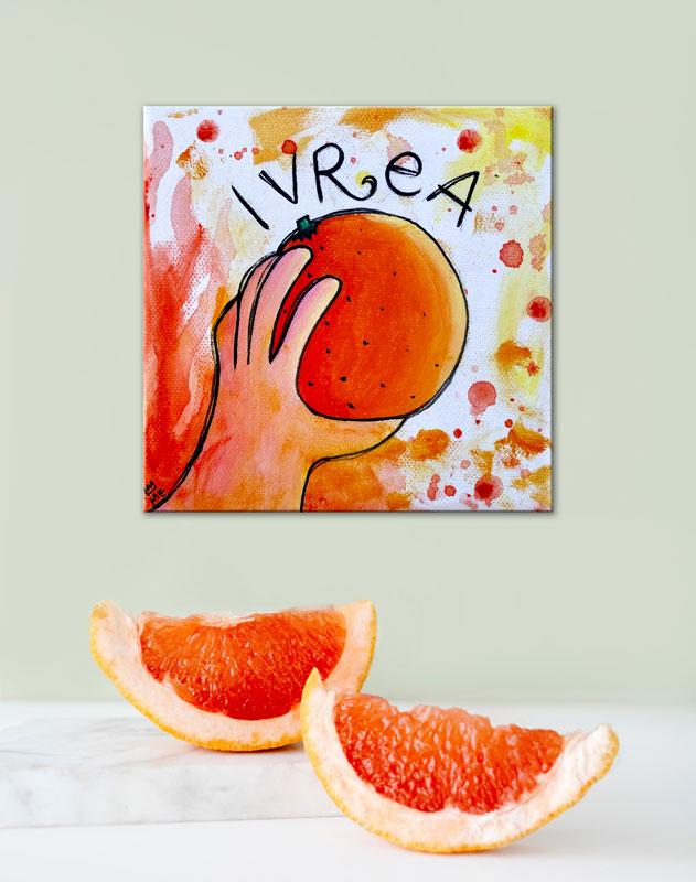 Ivrea - Mano con arancia