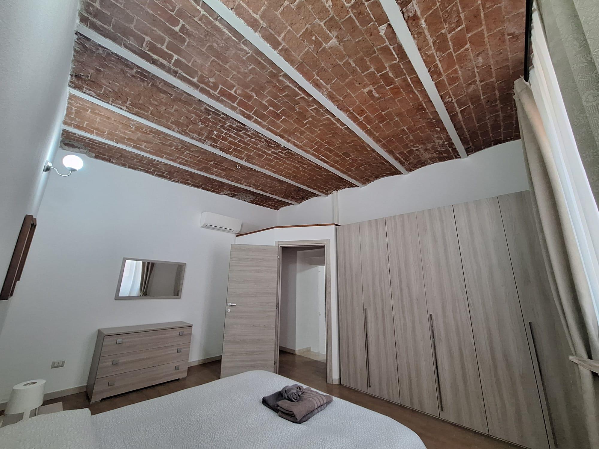 Original red bricks barrel vaults, your apartment in the heart of ancient Sardinia