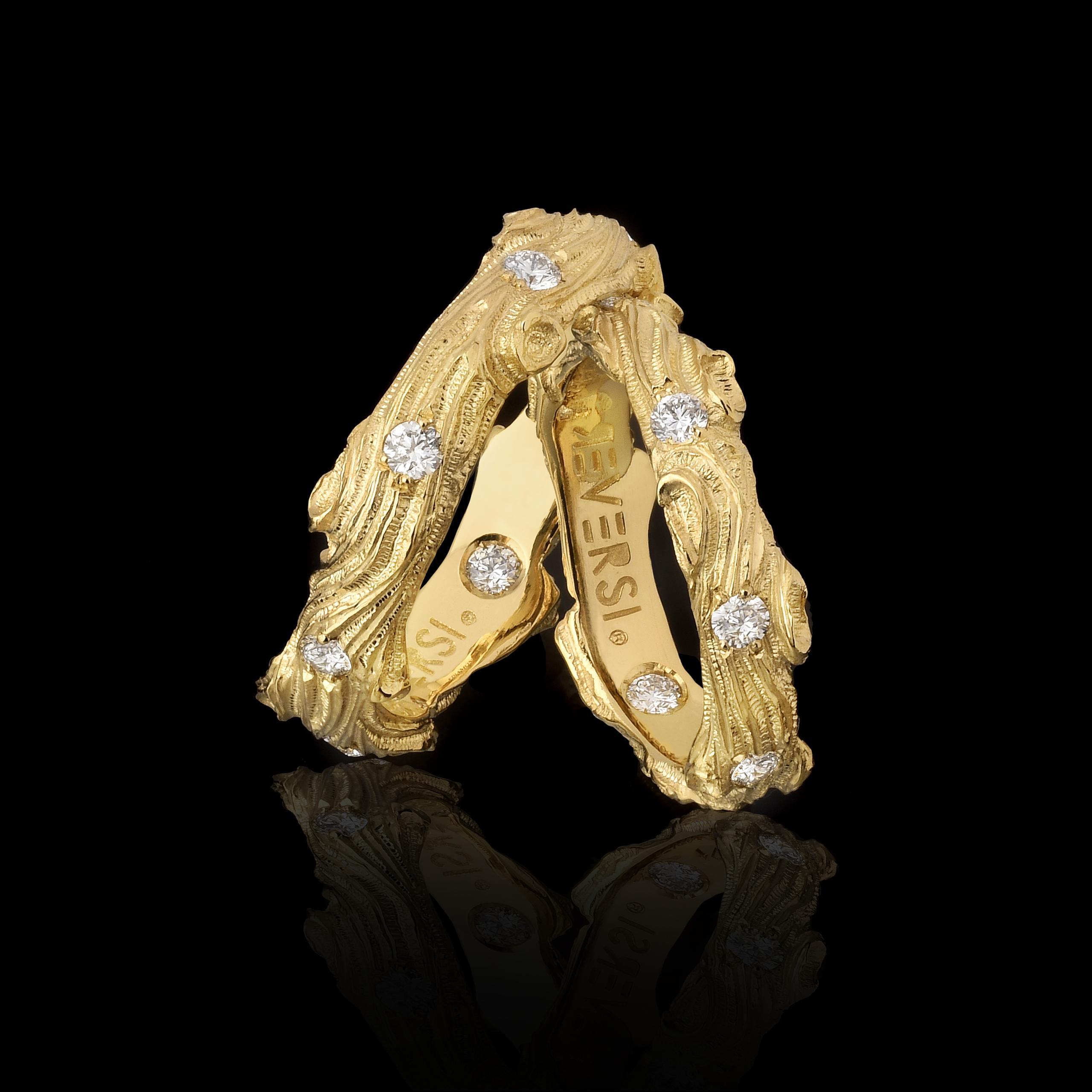 Oro giallo 18kt e 9 diamanti bianchi naturali, caratura totale 0,43kt