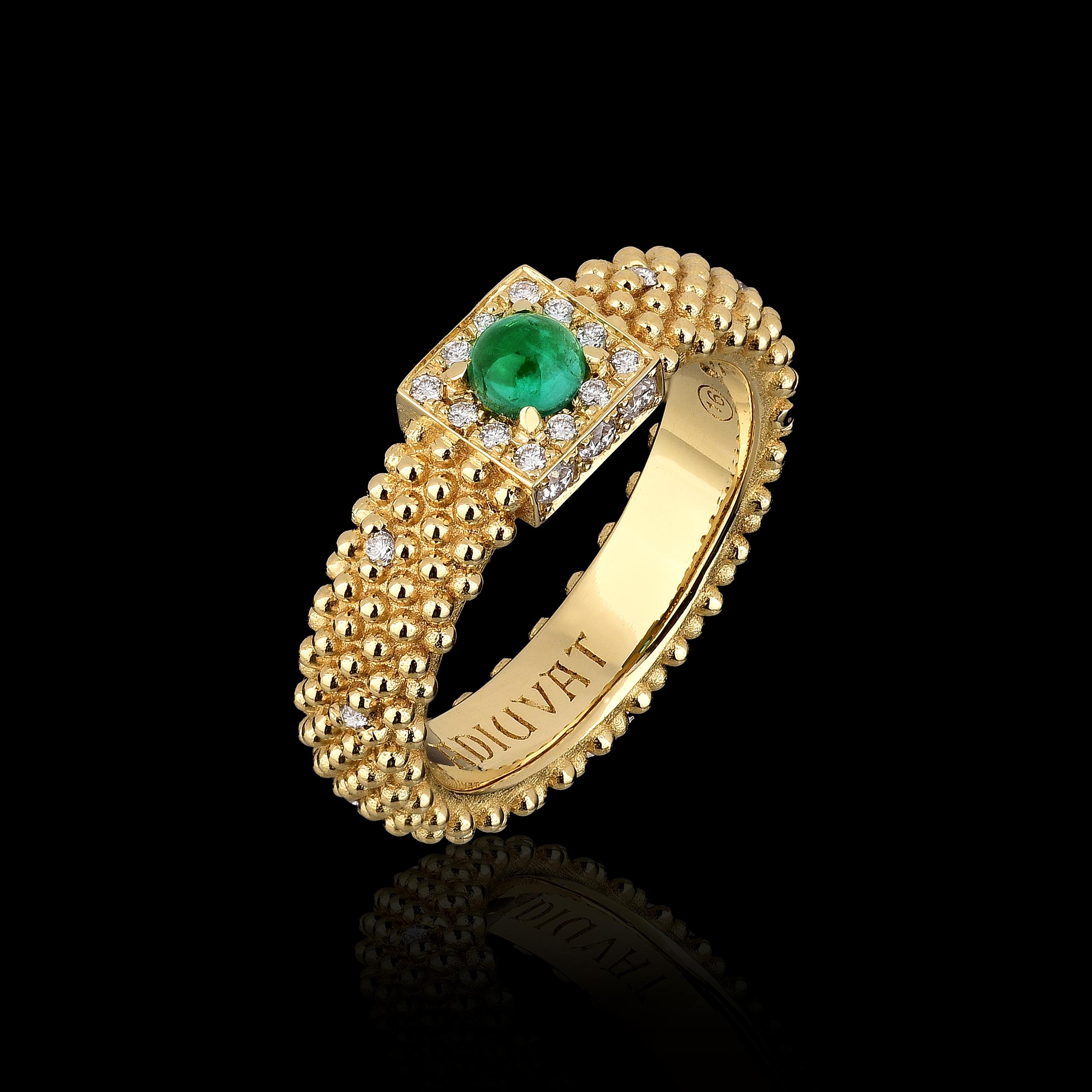 18kt yellow gold, emerald center stone with 18 natural white diamonds framing and diamond points