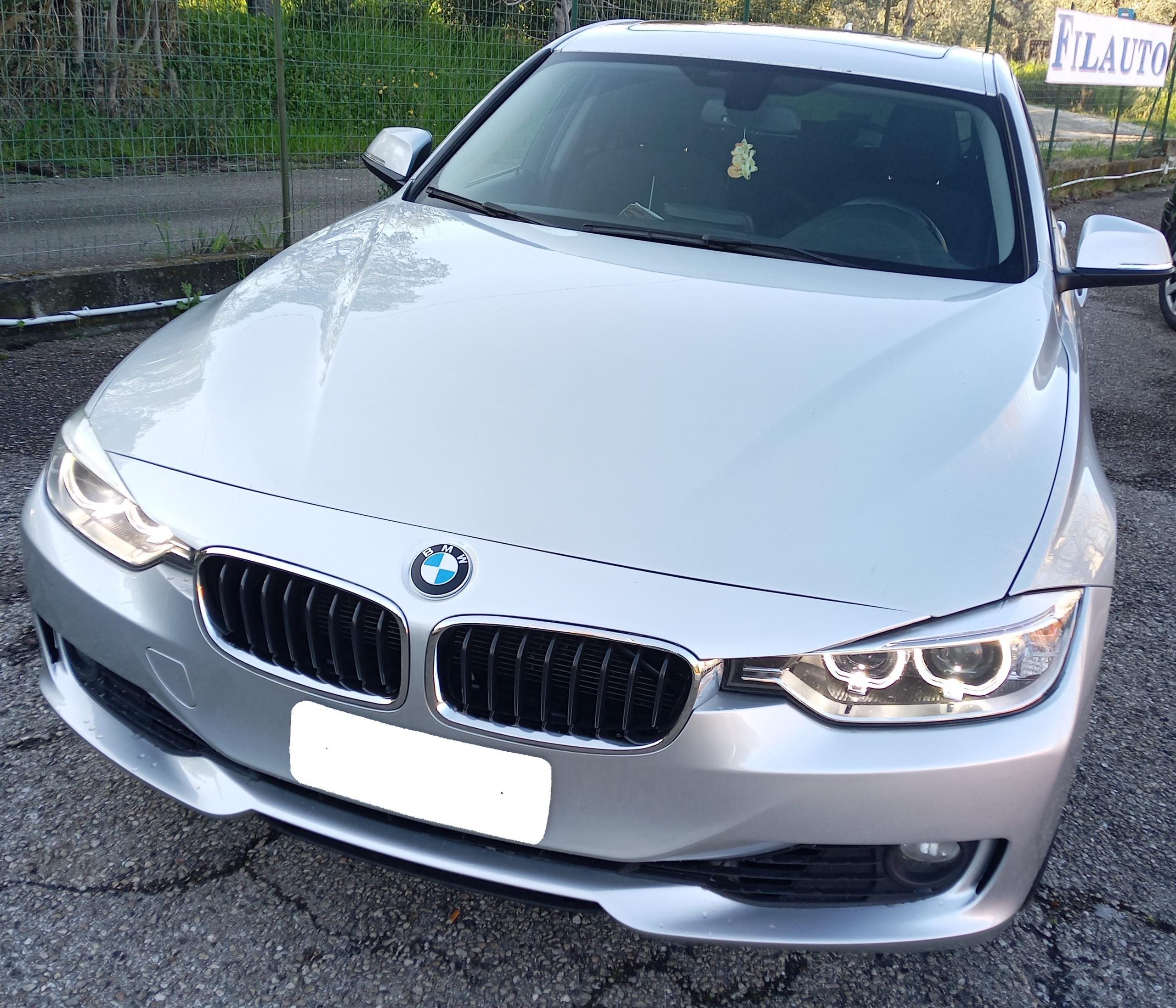 2014 BMW 318d touring sport 12.500 €