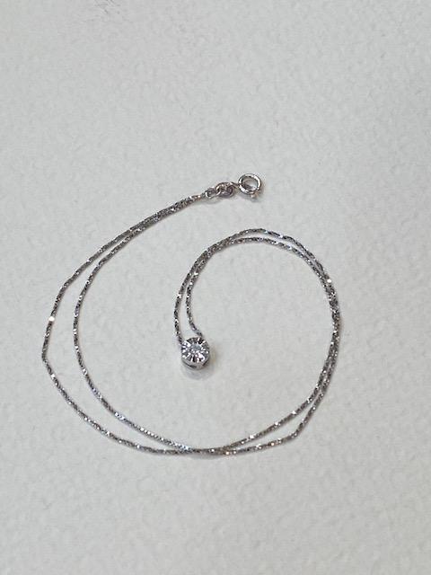 Collezione "Diamanti naturali" Punto luce in oro bianco e diamante naturale